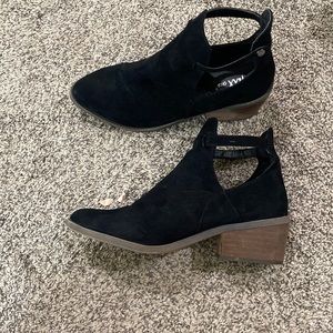 Black ankle booties with snap closure